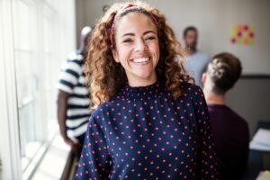 Smiling woman on Seroquel after finding support for alcohol recovery